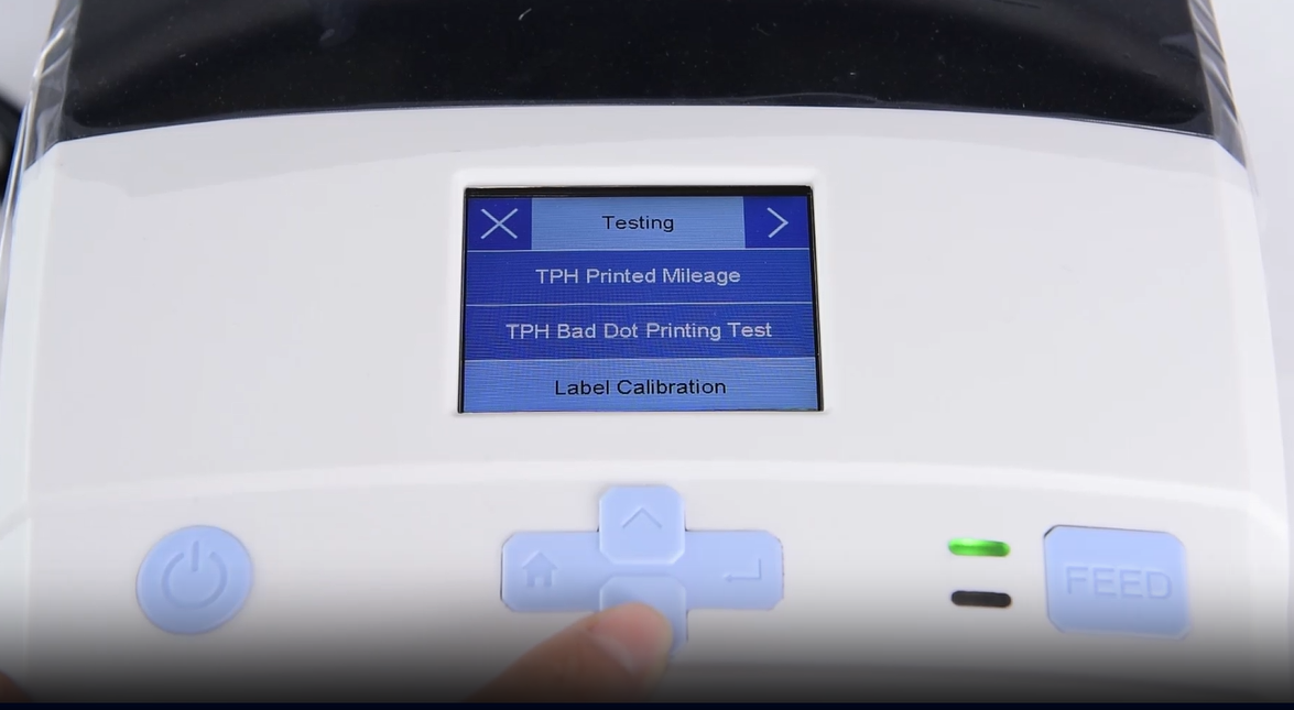 Ein close-up of a machine's digital interface showing a testing menu.